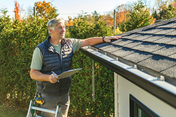 Professional Flat Roof Repair technician working in Saline, MI